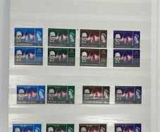 Collection. Brown stock book with collection of stamps celebrating Winston Churchill. Most are mint never hinged (MNH)