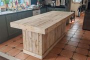 Rustic kitchen island with triple overhang
