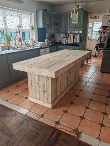 Rustic kitchen island with triple overhang