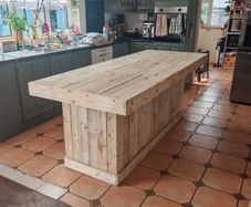 Rustic kitchen island with triple overhang