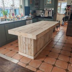 Rustic kitchen island with triple overhang