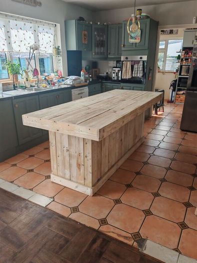 Rustic kitchen island with triple overhang