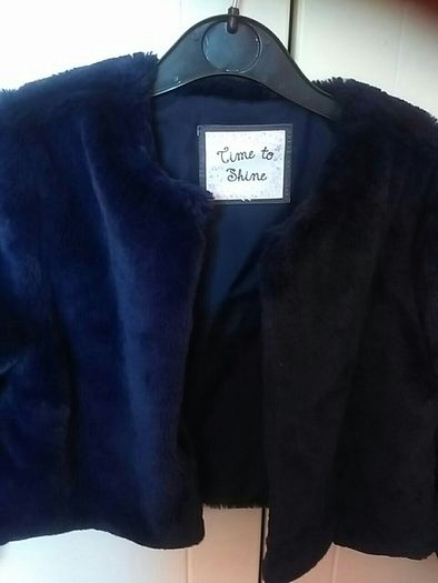 Navy Faux fur bolero jacket.