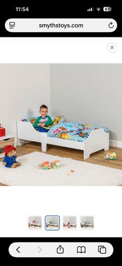 White Wooden Toddler bed