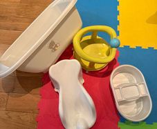 Activity gym, tummy time pillow, baby bath, door jumper