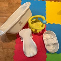 Activity gym, tummy time pillow, baby bath, door jumper