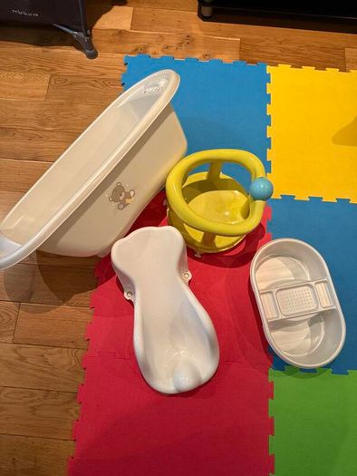 Activity gym, tummy time pillow, baby bath, door jumper