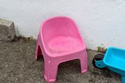 kids chair and toy wheel barrow