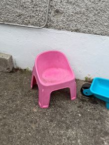 kids chair and toy wheel barrow