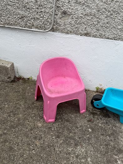 kids chair and toy wheel barrow