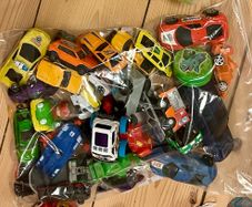 Toy cars, wooden letters and numbers