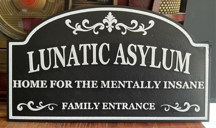 Lunatic asylum sign