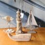 Nautical Themed Decorative Items x6 A Lighthouse And A Sailing Boat 2 Fish And A Windchimes. All In Good Condition. Image 2