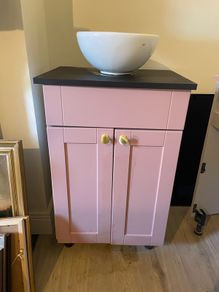 Bathroom sink and cabinet