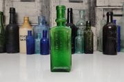 396 - Antique Aceite De Bellotas y Savia De Coco Green Glass Bottle