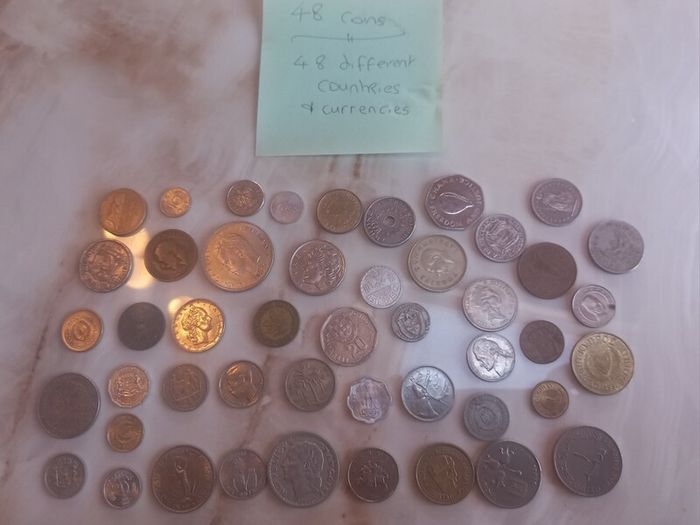 650 coins from around the world, post 6e, D18