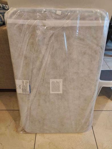 mattress - brand new chicco next to me