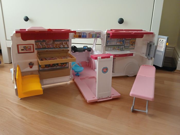 Barbie ambulance with sounds foldable clinic