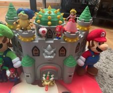 Super Mario figures,castles and poster
