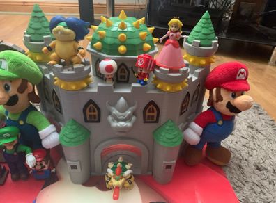 Super Mario figures,castles and poster