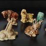 vintage glass display wall cabinet with Wade collection figurines Image 5