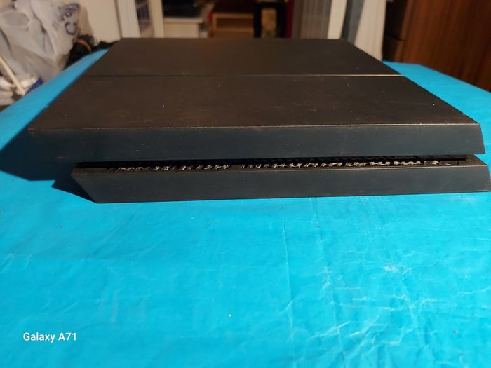Playstation 4, Model CUH-1216A. Powers on and Off, comes with power cable only,