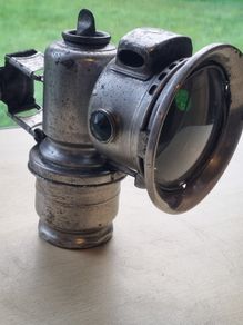 An antiqu Carbide (acetylene) lamp made by Joseph Lucas Ltd.
