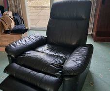 Reclining leather armchair