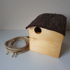 Birdhouse with bark roof