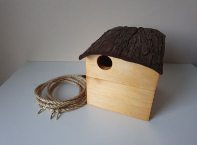 Birdhouse with bark roof
