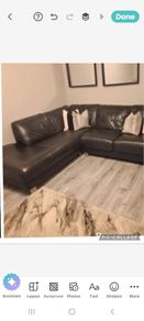 Black leather corner sofa