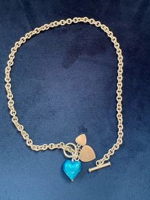 Silver necklace with blue heart pendant