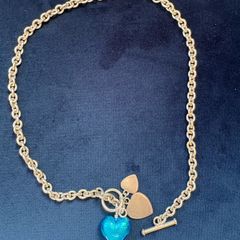 Silver necklace with blue heart pendant