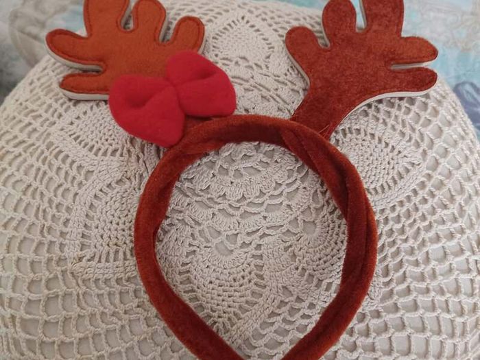 Reindeer antler headband with red bow