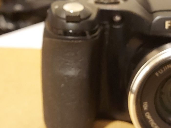 Fujifilm FinePix S5800 Digital Camera, Takes 4 AA Batteries, not powering on, for parts or repair