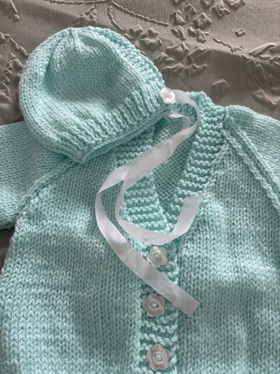 hand knitted baby blankets and cardigans