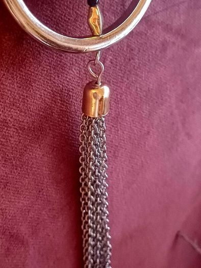Long two-tone and tassel necklace