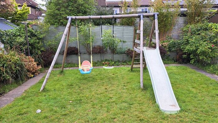 Swing set with slide