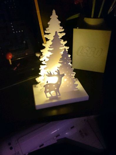Light-up wooden Christmas tree and reindeer ornament