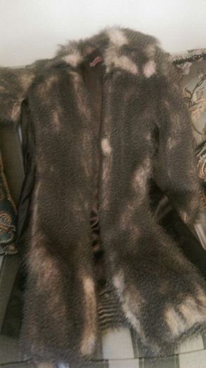 Fur leather coat.New.size 10