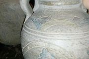 Unglazed terracotta pilgrim flask and jug