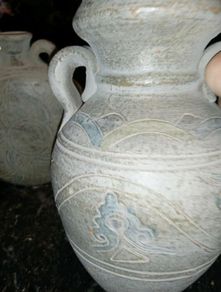 Unglazed terracotta pilgrim flask and jug