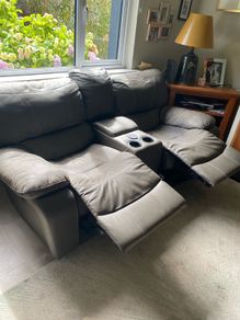 2 Two seater Leya leather power reclining sofas