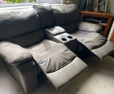 2 Two seater Leya leather power reclining sofas