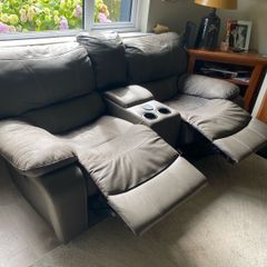 2 Two seater Leya leather power reclining sofas