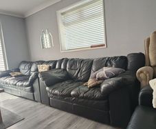 Black leather sofas