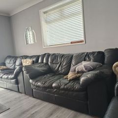 Black leather sofas
