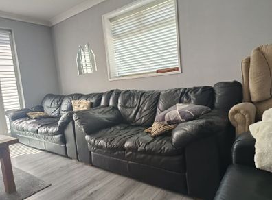 Black leather sofas