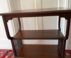 Mahogany table with glass top.