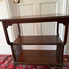 Mahogany table with glass top.